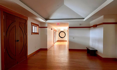 Photo of Chapin Mill hallway with enso at the end