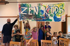 Photo of Zen Kids with a banner