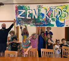 Photo of children under their "Zen Kids" banner