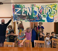 Photo of children under their "Zen Kids" banner